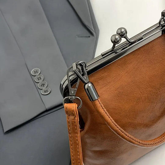 Amelia’s Timeless Kiss Lock | Vintage Handbag - Joan's Bags